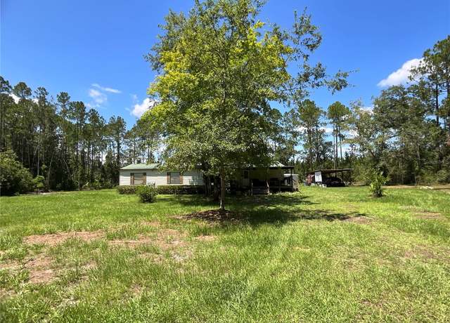 Property at 12017 NE 139th Pl, Fort Mc Coy, FL 32134, 4 beds, 2 baths