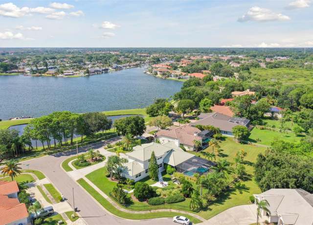Property at 5709 E Longboat Blvd, Tampa, FL 33615, 4 beds, 4 baths