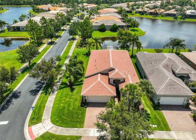 Property at 16227 Cape Coral Dr, Wimauma, FL 33598, 4 beds, 3 baths