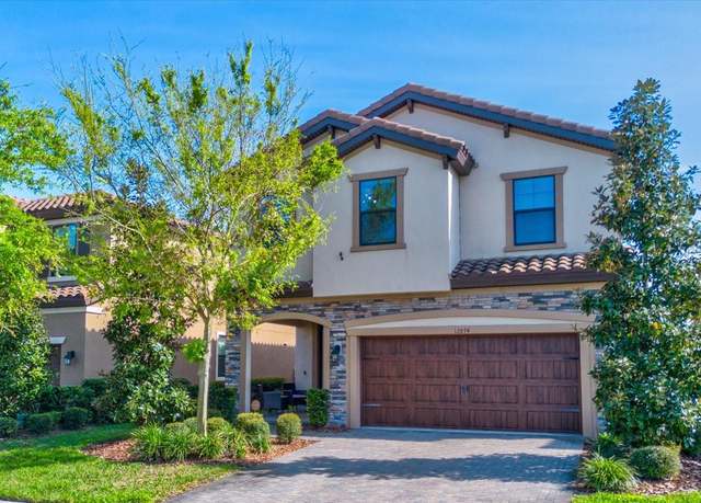 Property at 12874 Burns Dr, Odessa, FL 33556, 4 beds, 2.5 baths