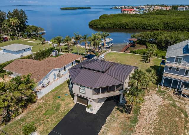 Property at 1616 Sea Breeze Dr, Tarpon Springs, FL 34689, 3 beds, 2 baths