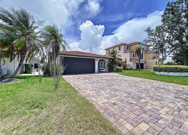 Property at 5040 Glenn Dr, New Port Richey, FL 34652, 4 beds, 3 baths