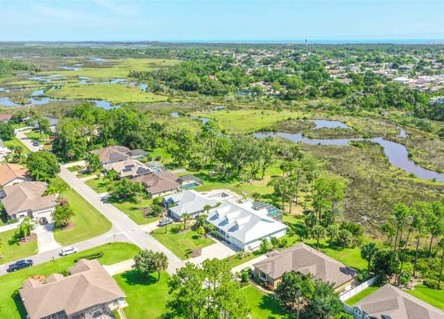 Property at 68 Colechester Ln, Palm Coast, FL 32137, 4 beds, 3.5 baths