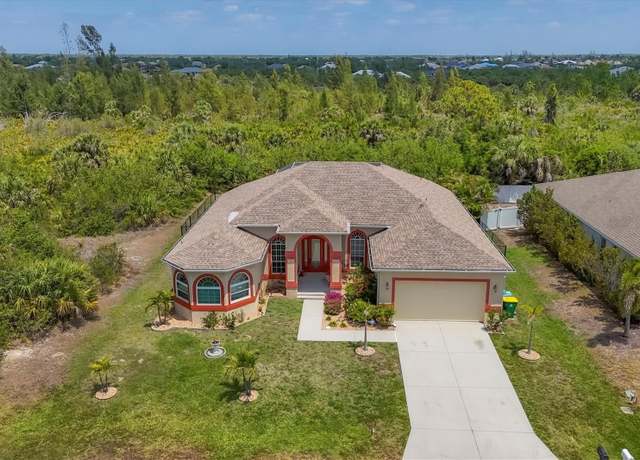 Property at 10495 Atenia St, Port Charlotte, FL 33981, 3 beds, 3 baths