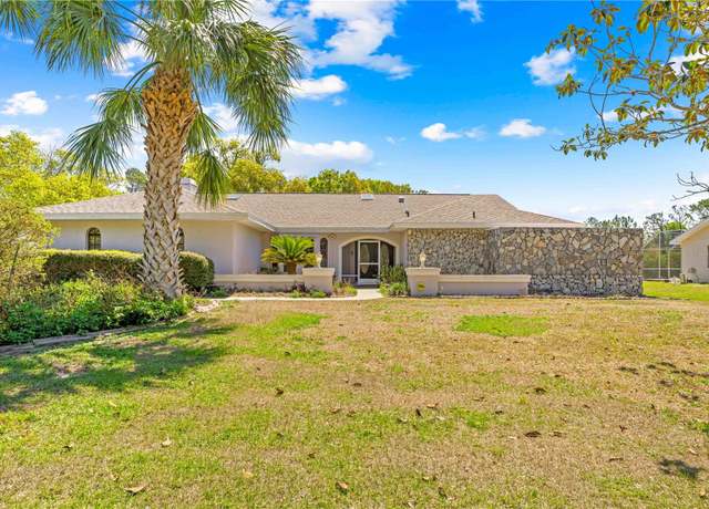 Property at 9060 Prespare Ct, Spring Hill, FL 34606, 3 beds, 2.5 baths