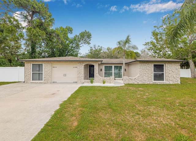 Property at 7607 New York Ave, Hudson, FL 34667, 4 beds, 2 baths