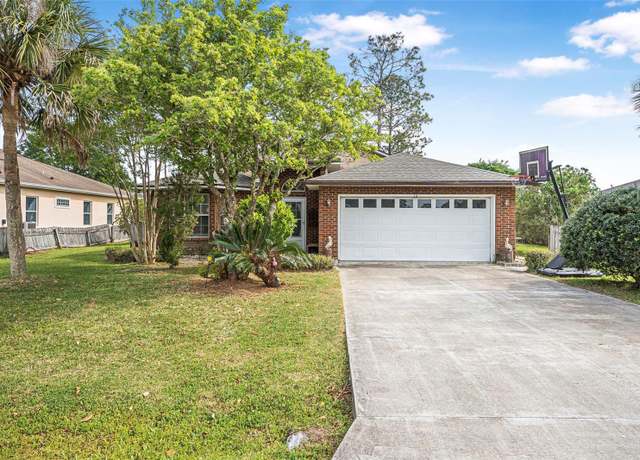 Property at 14 Wood Amber Ln, Palm Coast, FL 32164, 3 beds, 2 baths