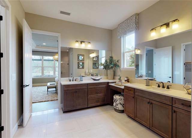Property at 987 Ladyfish Trl, St Cloud, FL 34771, 5 beds, 4.5 baths