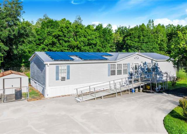 Property at 9330 Woodview Dr, Polk City, FL 33868, 3 beds, 2 baths