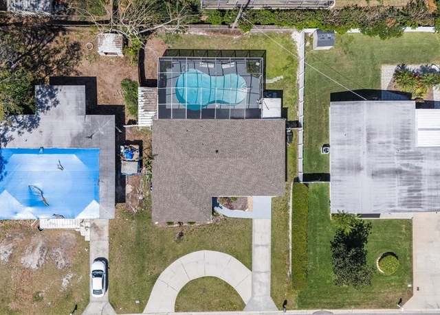 Property at 8006 N Ola Ave, Tampa, FL 33604, 3 beds, 2 baths