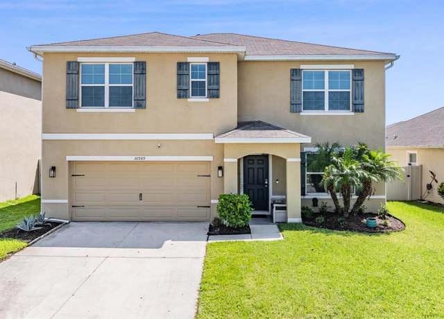Property at 30989 Summer Sun Loop, Wesley Chapel, FL 33545, 5 beds, 3 baths