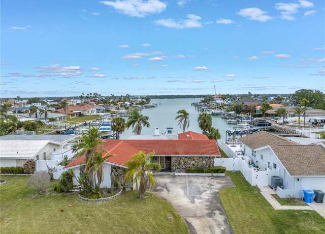 Property at 11755 7th St E, Treasure Island, FL 33706, 3 beds, 3 baths