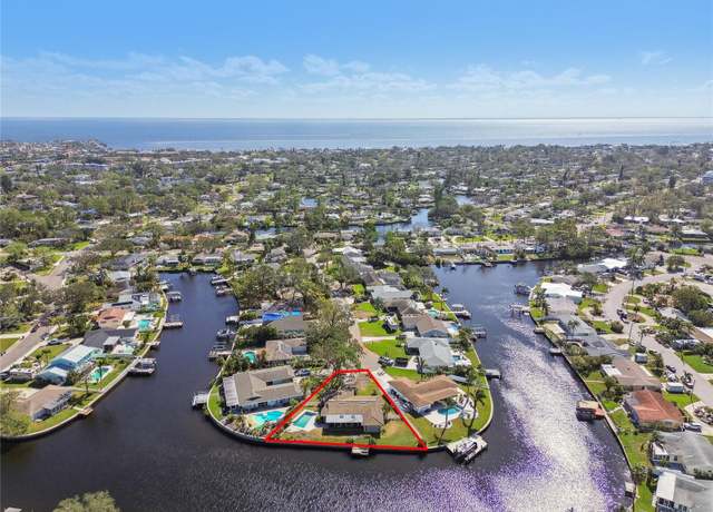 Property at 5181 Horseshoe Pl NE, St Petersburg, FL 33703, 4 beds, 2 baths