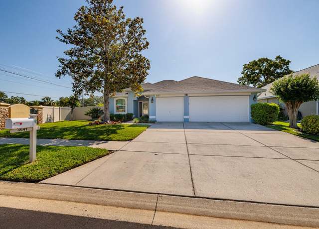 Property at 4997 W Breeze Cir, Palm Harbor, FL 34683, 3 beds, 3 baths
