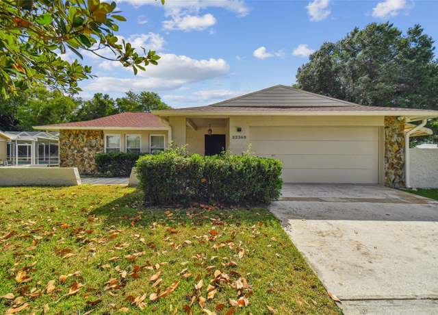 Property at 22368 Southshore Dr, Land O Lakes, FL 34639, 4 beds, 3 baths