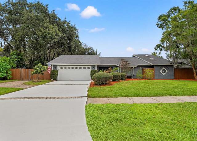 Property at 573 Whispering Lakes Blvd, Tarpon Springs, FL 34688, 5 beds, 3 baths