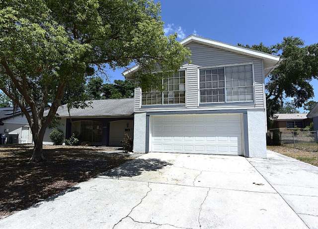 Property at 12210 Quail Run Row, Hudson, FL 34667, 4 beds, 3 baths