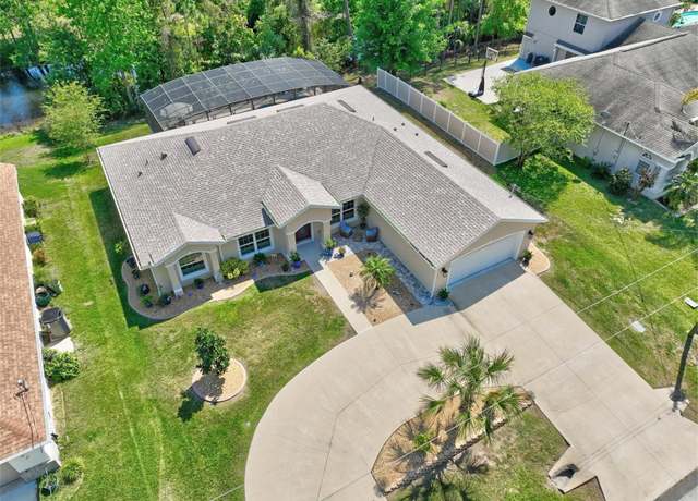 Property at 50 Westbury Ln, Palm Coast, FL 32164, 4 beds, 2 baths