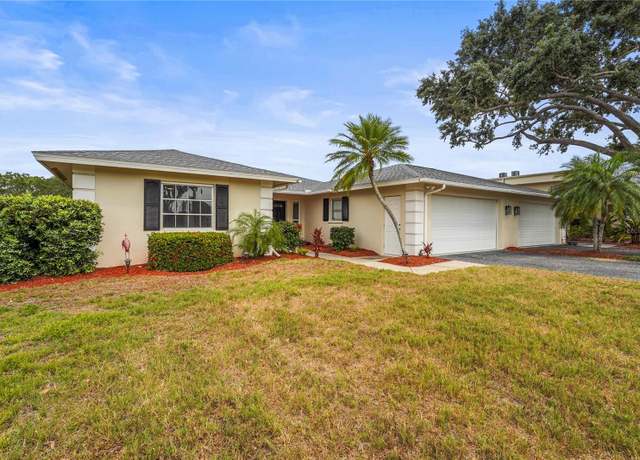 Property at 7391 W Country Club Dr N, Sarasota, FL 34243, 3 beds, 2 baths
