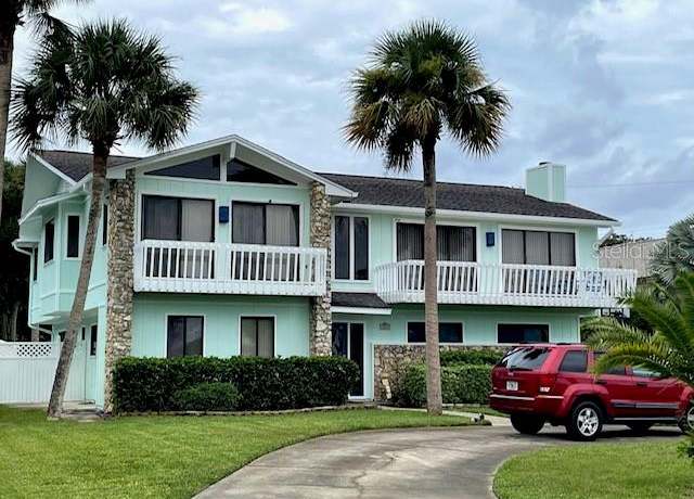 Property at 1012 S Riverside Dr, Edgewater, FL 32132, 4 beds, 4 baths