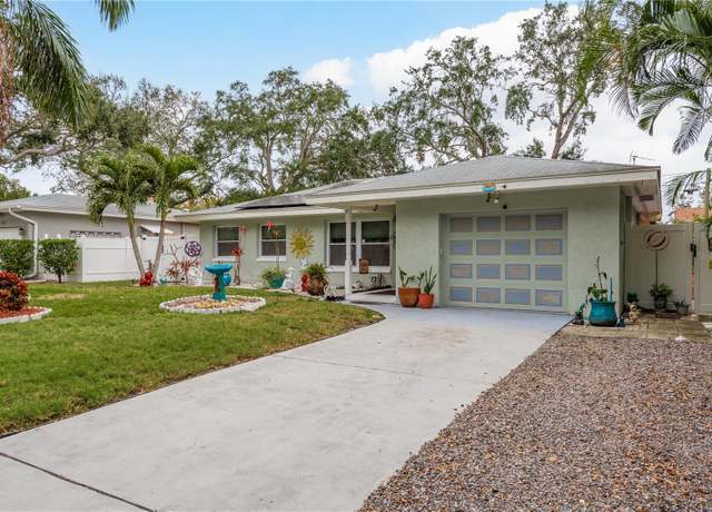 Property at 1611 San Charles Dr, Dunedin, FL 34698, 2 beds, 2 baths
