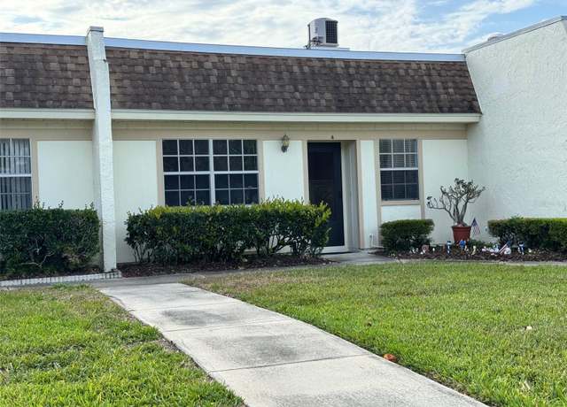 Property at 11310 Carriage Hill Dr #4, Port Richey, FL 34668, 2 beds, 2 baths