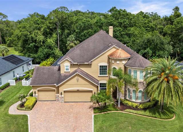 Property at 3148 Watermark Dr, Wesley Chapel, FL 33544, 5 beds, 4 baths
