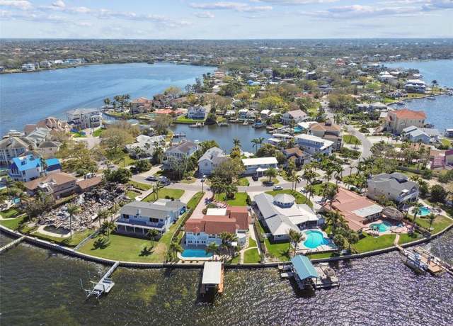 Property at 119 Carlyle Cir, Palm Harbor, FL 34683, 4 beds, 4 baths