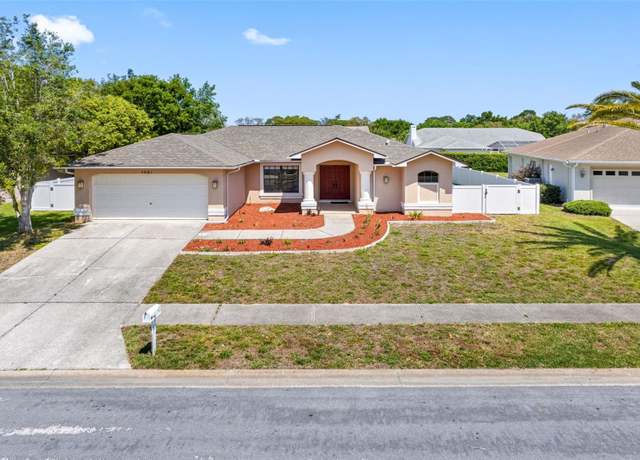 Property at 1061 Archway Dr, Spring Hill, FL 34608, 4 beds, 3 baths