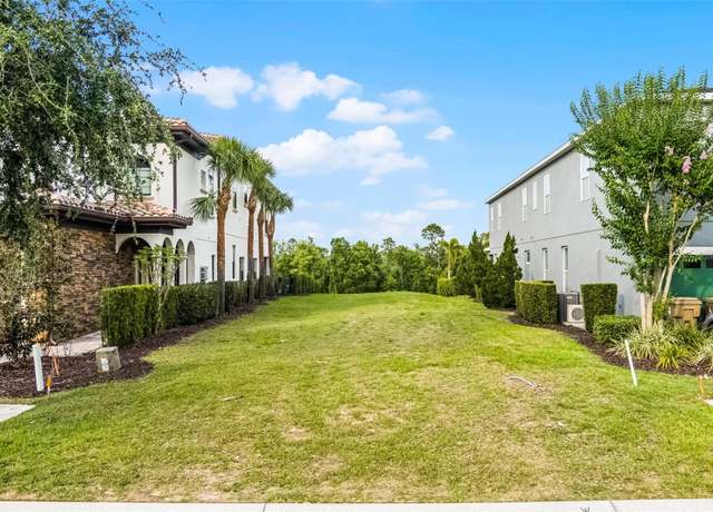 Property at 741 Golden Bear Dr, Reunion, FL 34747