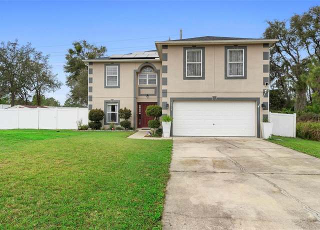 Property at 3318 Dewberry Dr, Deltona, FL 32738, 4 beds, 2.5 baths