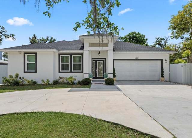 Property at 19212 Sunlake Blvd, Lutz, FL 33558, 4 beds, 2 baths
