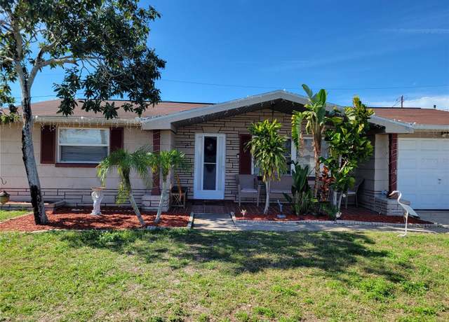 Property at 1153 Tamarac Dr, Holiday, FL 34690, 3 beds, 1.5 baths