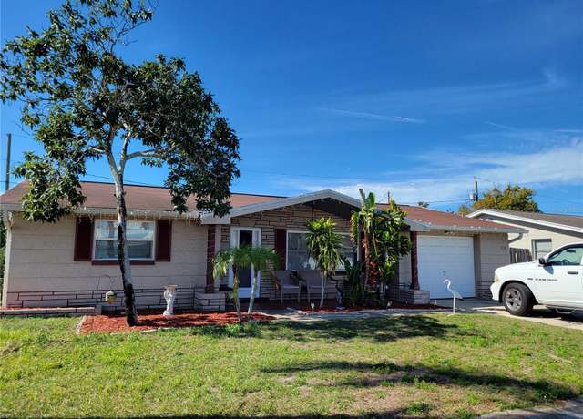 Property at 1153 Tamarac Dr, Holiday, FL 34690, 3 beds, 1.5 baths