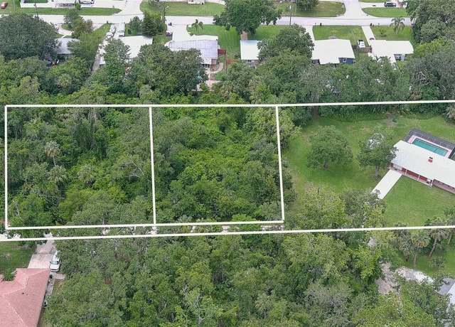 Property at 585 Corbin Park Rd, New Smyrna Beach, FL 32168, 3 beds, 2 baths