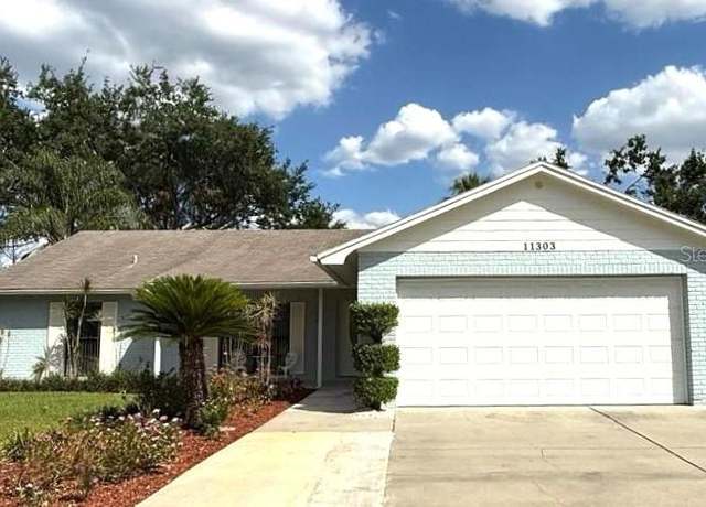 Property at 11303 Hollyglen Dr, Tampa, FL 33624, 4 beds, 3 baths