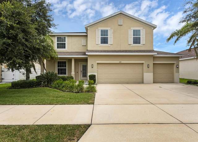 Property at 628 Neptune Dr, Groveland, FL 34736, 4 beds, 2.5 baths