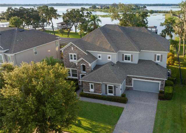 Property at 15986 Johns Lake Overlook Dr, Winter Garden, FL 34787, 5 beds, 5 baths