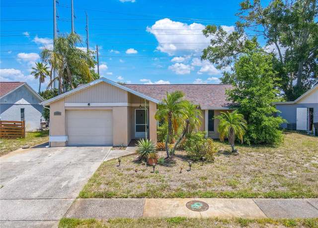 Property at 1034 Mandarin Dr, Holiday, FL 34691, 3 beds, 2 baths