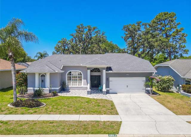 Property at 4951 Musselshell Dr, New Port Richey, FL 34655, 4 beds, 3 baths