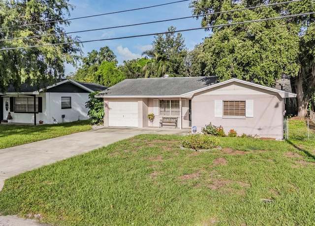 Property at 8710 N Pawnee Ave, Tampa, FL 33617, 4 beds, 2 baths