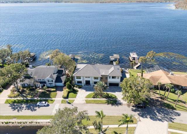 Property at 9138 Bay Point Dr, Orlando, FL 32819, 4 beds, 4.5 baths
