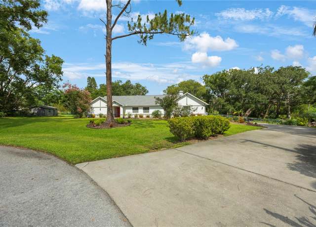 Property at 5933 Carina Trce, Wesley Chapel, FL 33545, 4 beds, 2 baths