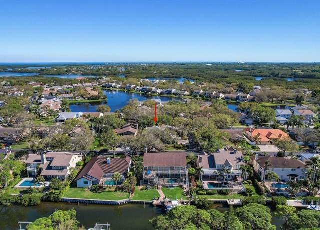 Property at 902 Marco Dr NE, St Petersburg, FL 33702, 4 beds, 3.5 baths