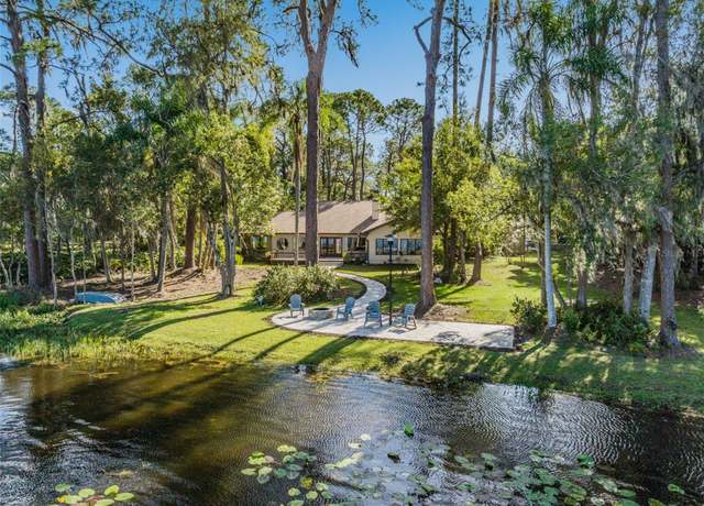 Property at 8011 N Mobley Rd, Odessa, FL 33556, 4 beds, 3 baths