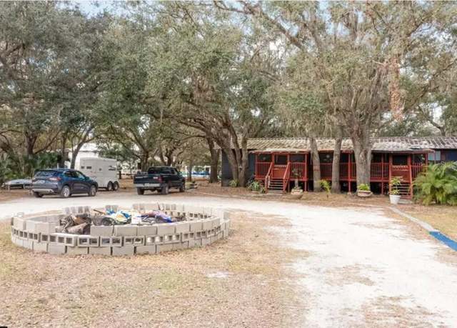 Property at 1279 NE River Rock Dr, Arcadia, FL 34266, 4 beds, 2 baths