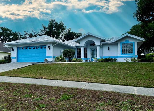 Property at 1039 Greenturf Rd, Spring Hill, FL 34608, 4 beds, 3 baths