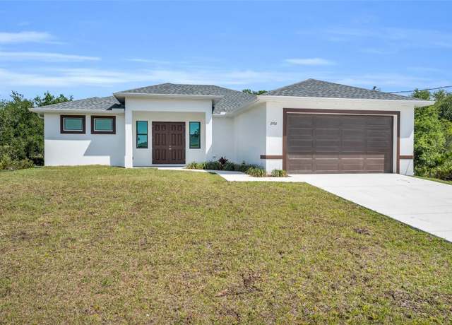 Property at 813 Poinsettia Ave, Lehigh Acres, FL 33972, 4 beds, 2 baths