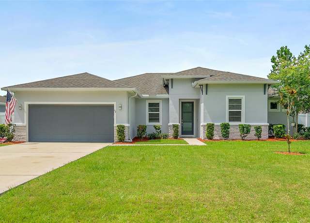 Property at 62 Riverina Dr, Palm Coast, FL 32164, 4 beds, 3 baths