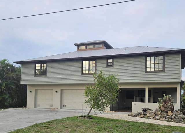 Property at 33 Tee View Pl, Rotonda West, FL 33947, 4 beds, 4.5 baths